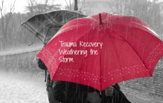Trauma Therapy - Trauma Recovery: Weathering the Storm - Red umbrella in black and white rain