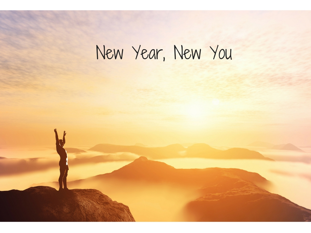Therapy Practice - New Year, New You - Man on a mountain at sunset/rise
