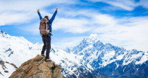 Greenwood Counseling Center man conquering a mountain after PTSD therapy